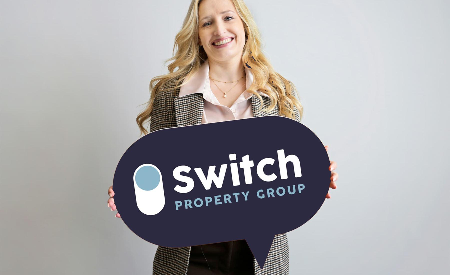 Branded estate agent sign used for property marketing and agency branding